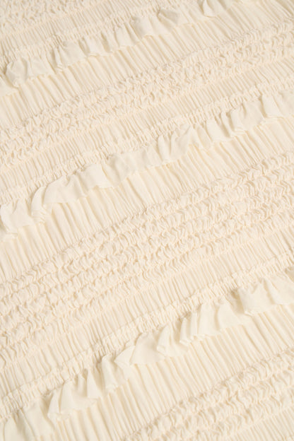 Ruffled High-Neck Backless Top in Ivory